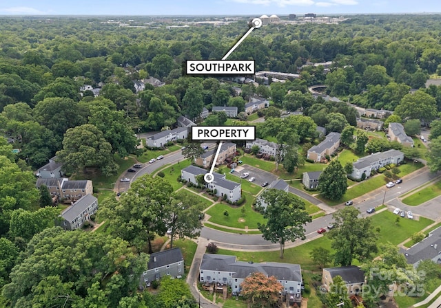 504 Wakefield Dr Unit A, Charlotte, NC 28209 - aerial view of property and surrounding area featuring a forest