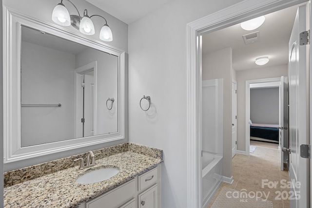 1335 Bryson Gap Dr, Fort Mill, SC 29715 - full bathroom with vanity, tile patterned flooring, and washtub / shower combination