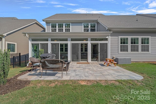 1335 Bryson Gap Dr, Fort Mill, SC 29715 - rear view of house featuring a patio area and a sunroom