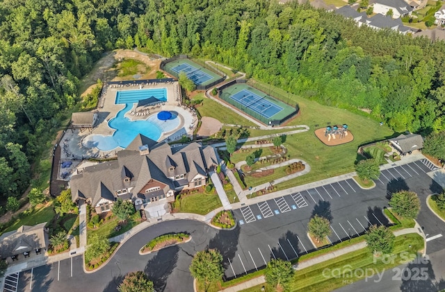 1335 Bryson Gap Dr, Fort Mill, SC 29715 - aerial view of property's location featuring a pool and a forest