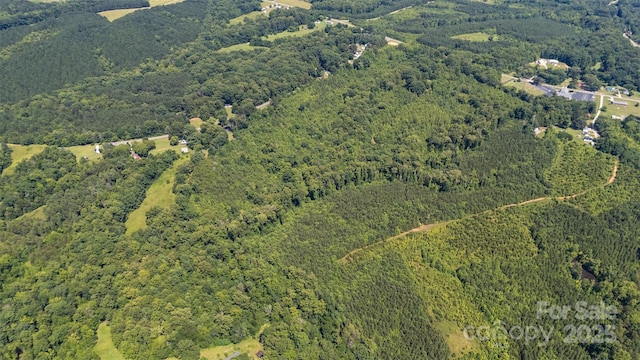 5600 Walters Mill Rd, Providence, NC 27315 - aerial overview of property's location featuring a heavily wooded area