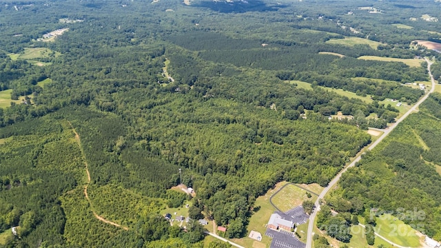 5600 Walters Mill Rd, Providence, NC 27315 - aerial overview of property's location featuring a heavily wooded area