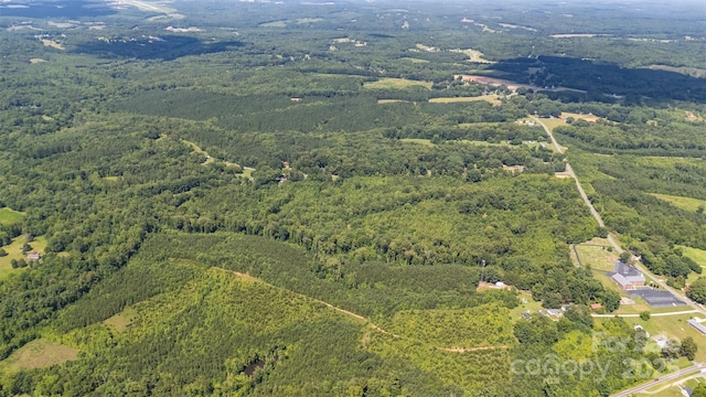 5600 Walters Mill Rd, Providence, NC 27315 - aerial view of property and surrounding area with a forest