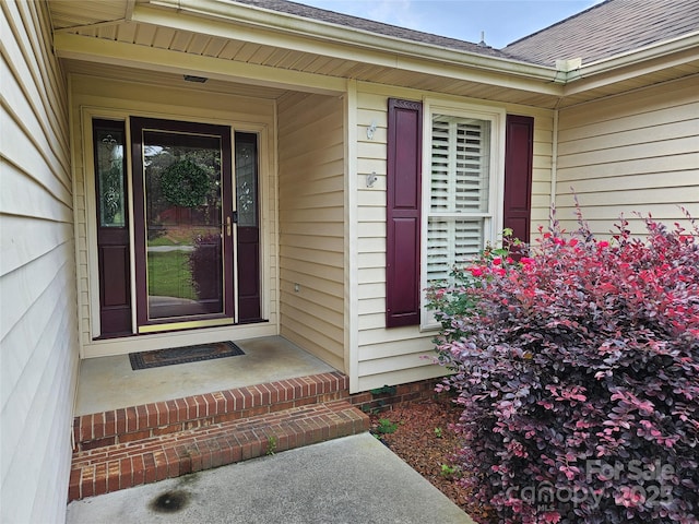 217 Rock Creek Dr, Lincolnton, NC 28092 - view of exterior entry with a shingled roof