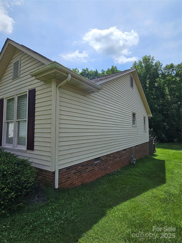 217 Rock Creek Dr, Lincolnton, NC 28092 - view of home's exterior featuring crawl space and a lawn