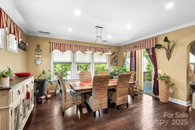 16402 Doves Canyon Ln, Charlotte, NC 28278 - dining room with ornamental molding, dark wood finished floors, recessed lighting, and arched walkways