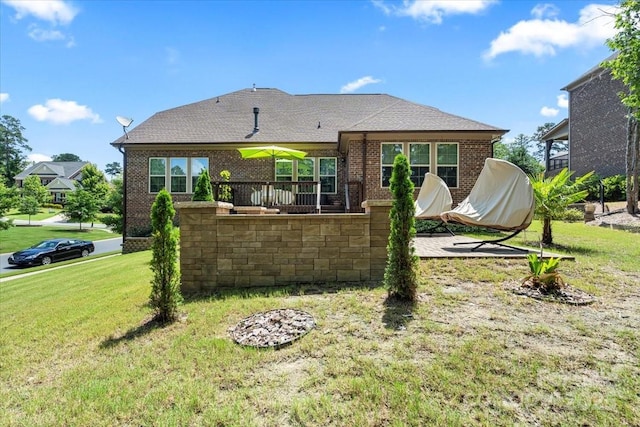 16402 Doves Canyon Ln, Charlotte, NC 28278 - back of house with brick siding and a lawn