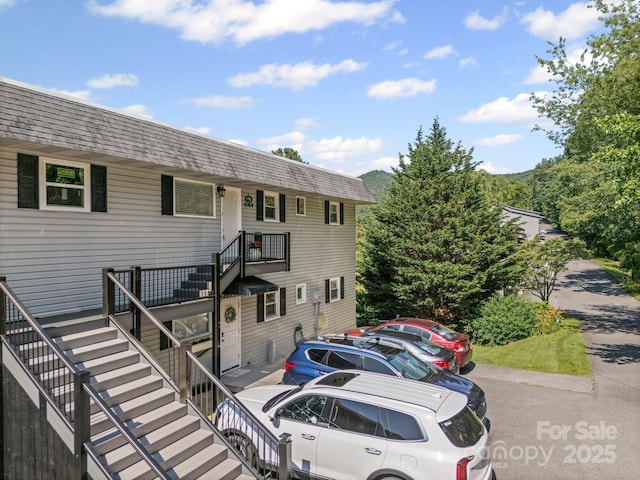 263 Fairway Ln Unit H, Spruce Pine, NC 28777 - view of front facade with stairs and a shingled roof
