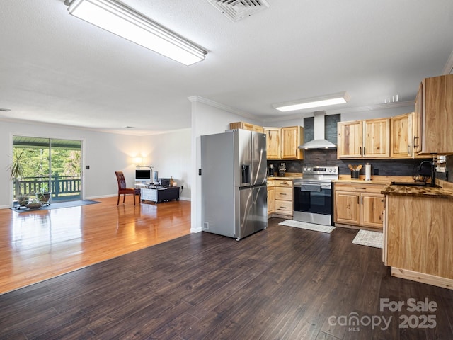 263 Fairway Ln Unit H, Spruce Pine, NC 28777 - kitchen featuring appliances with stainless steel finishes, wall chimney exhaust hood, open floor plan, tasteful backsplash, and ornamental molding