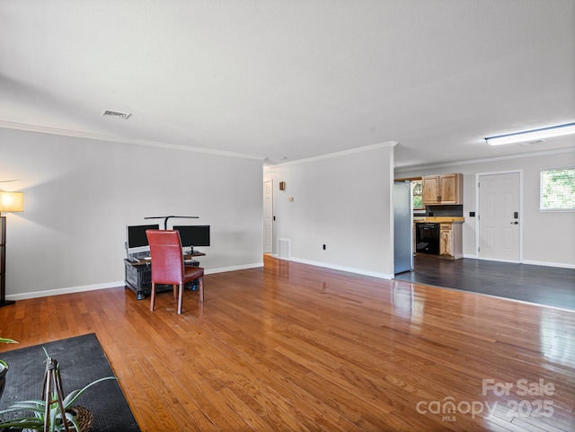 263 Fairway Ln Unit H, Spruce Pine, NC 28777 - living room featuring wood finished floors and ornamental molding