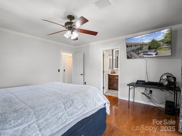 263 Fairway Ln Unit H, Spruce Pine, NC 28777 - bedroom featuring wood finished floors, ornamental molding, a ceiling fan, and connected bathroom