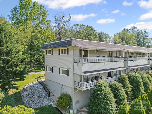 263 Fairway Ln Unit H, Spruce Pine, NC 28777 - view of home's exterior with roof with shingles and a balcony