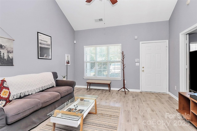 5980 Cougar Ln, Charlotte, NC 28269 - living room featuring ceiling fan, light wood-type flooring, and high vaulted ceiling