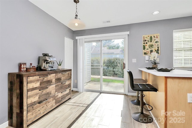5980 Cougar Ln, Charlotte, NC 28269 - dining space featuring light wood-type flooring and recessed lighting