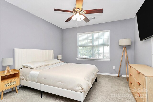 5980 Cougar Ln, Charlotte, NC 28269 - bedroom featuring carpet and a ceiling fan