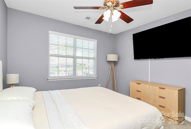 5980 Cougar Ln, Charlotte, NC 28269 - bedroom with a ceiling fan and baseboards
