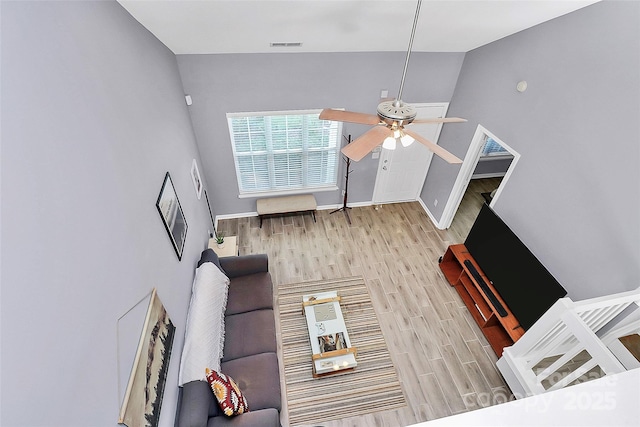 5980 Cougar Ln, Charlotte, NC 28269 - living area with ceiling fan and wood finished floors