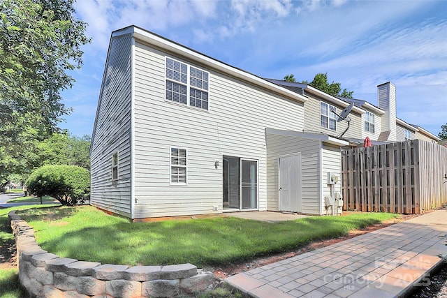 5980 Cougar Ln, Charlotte, NC 28269 - rear view of property featuring a patio area