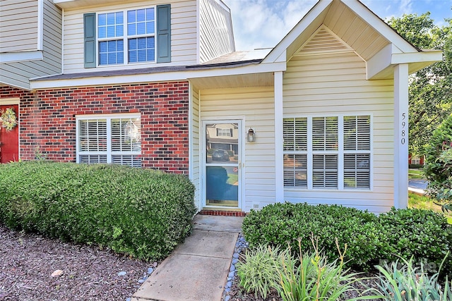 5980 Cougar Ln, Charlotte, NC 28269 - view of exterior entry featuring brick siding