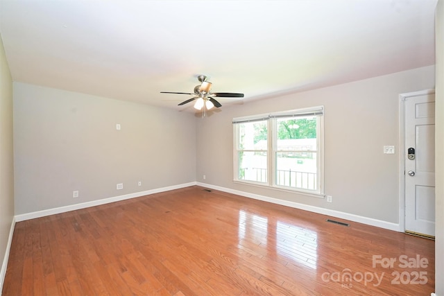 3729 Woodleaf Rd, Charlotte, NC 28205 - spare room with ceiling fan and wood finished floors