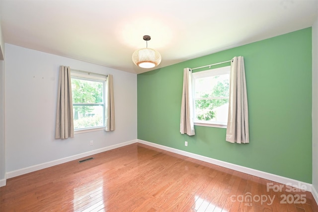 3729 Woodleaf Rd, Charlotte, NC 28205 - unfurnished room with wood finished floors