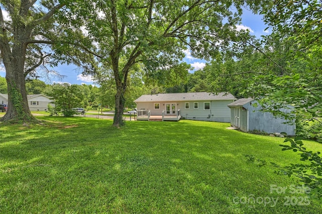3729 Woodleaf Rd, Charlotte, NC 28205 - view of green lawn with a wooden deck and a shed