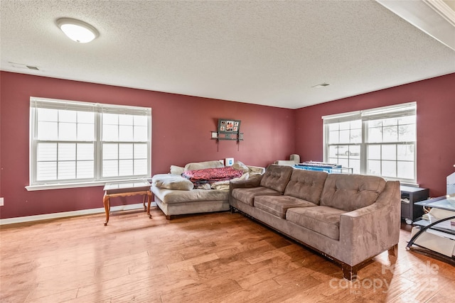 1276 Winding Path Rd, Clover, SC 29710 - living area with a textured ceiling and light wood-style flooring