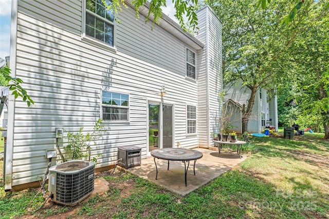 1276 Winding Path Rd, Clover, SC 29710 - rear view of house featuring a patio, a lawn, and a chimney