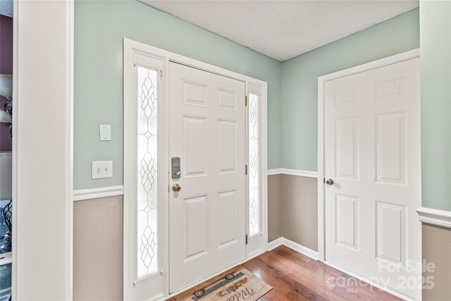 1276 Winding Path Rd, Clover, SC 29710 - foyer entrance with wood finished floors and healthy amount of natural light