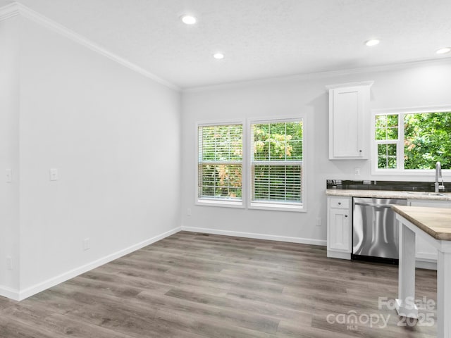 207 Walnut Branch Rd, Weaverville, NC 28787 - kitchen with stainless steel dishwasher, crown molding, white cabinetry, recessed lighting, and light countertops
