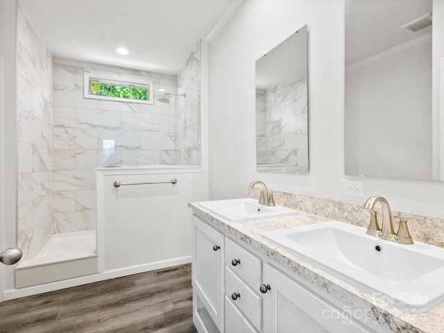 207 Walnut Branch Rd, Weaverville, NC 28787 - bathroom with crown molding, double vanity, walk in shower, and wood finished floors