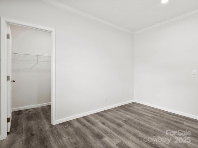 207 Walnut Branch Rd, Weaverville, NC 28787 - unfurnished bedroom with crown molding, wood finished floors, a spacious closet, a closet, and recessed lighting