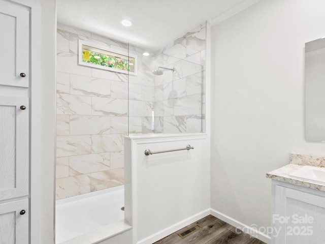 207 Walnut Branch Rd, Weaverville, NC 28787 - bathroom featuring vanity, a marble finish shower, and wood finished floors