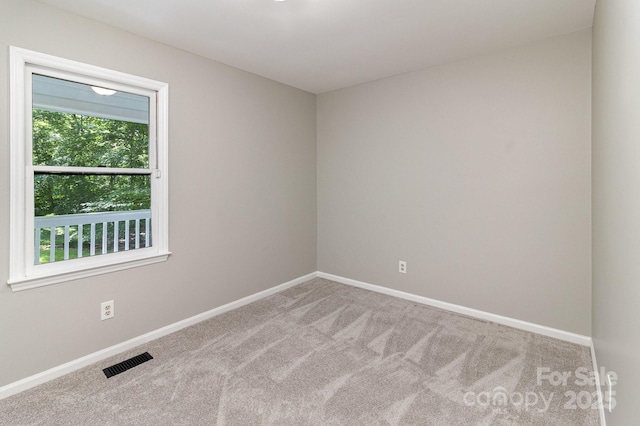 1118 Brookwood Dr, Stanley, NC 28164 - spare room with carpet and baseboards