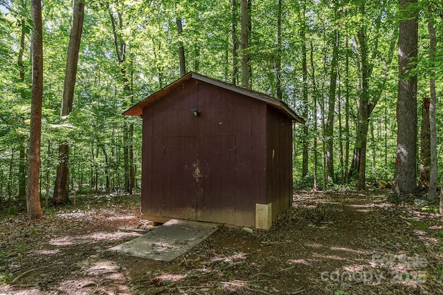 1118 Brookwood Dr, Stanley, NC 28164 - view of shed featuring a wooded view