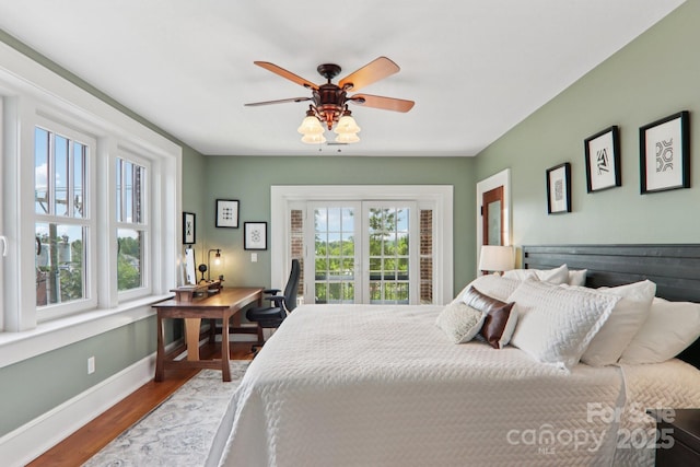 203 6th Ave W Unit 2A, Hendersonville, NC 28739 - bedroom featuring wood finished floors, a desk, and ceiling fan
