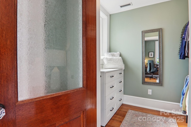 203 6th Ave W Unit 2A, Hendersonville, NC 28739 - bathroom featuring wood finished floors and vanity