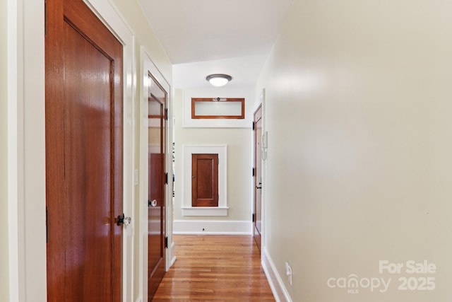 203 6th Ave W Unit 2A, Hendersonville, NC 28739 - hallway featuring light wood-style flooring and baseboards