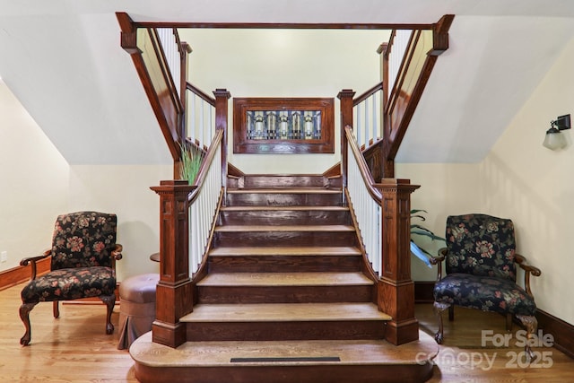 203 6th Ave W Unit 2A, Hendersonville, NC 28739 - staircase featuring wood finished floors and baseboards