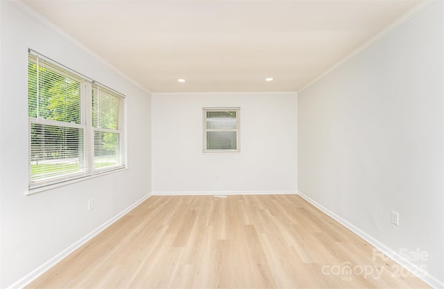 3724 Patricia Dr NW, Concord, NC 28027 - empty room featuring light wood-style floors, crown molding, and recessed lighting