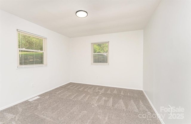 3724 Patricia Dr NW, Concord, NC 28027 - spare room featuring carpet flooring and baseboards