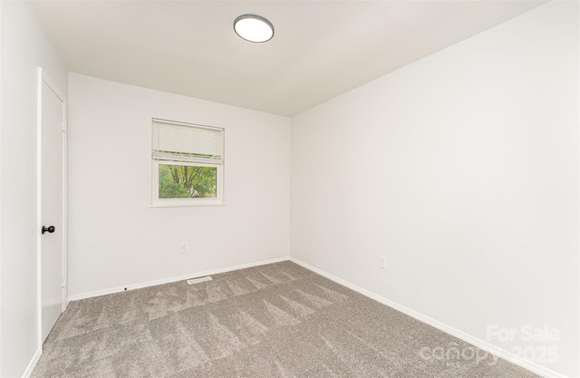 3724 Patricia Dr NW, Concord, NC 28027 - carpeted empty room with baseboards