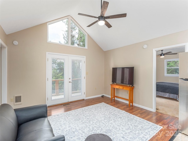 286 Keith Dr, Canton, NC 28716 - living area featuring ceiling fan, french doors, wood finished floors, and high vaulted ceiling