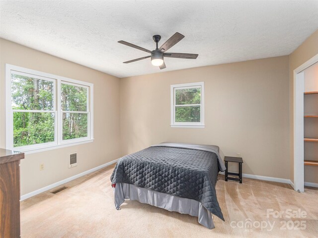 286 Keith Dr, Canton, NC 28716 - bedroom featuring carpet flooring, ceiling fan, and a textured ceiling
