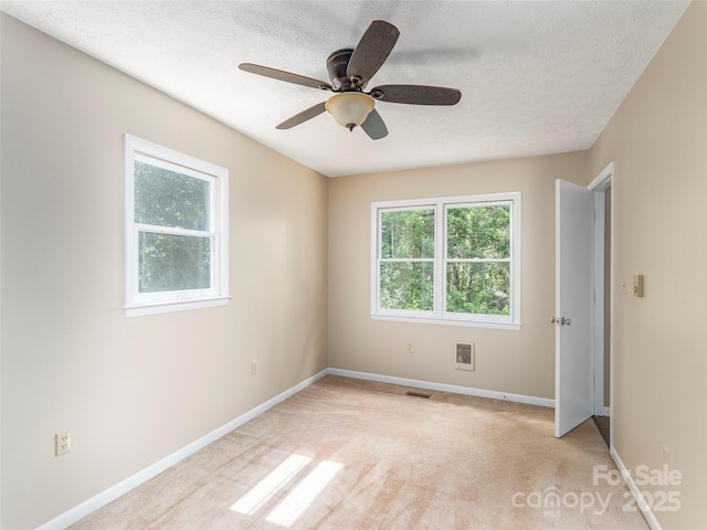 286 Keith Dr, Canton, NC 28716 - unfurnished room featuring a ceiling fan, light carpet, and a textured ceiling