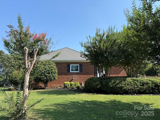 1280 Queensgate St, Gastonia, NC 28054 - view of side of home featuring a yard, brick siding, and roof with shingles