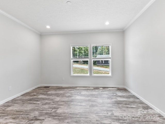 208 Walnut Branch Rd, Weaverville, NC 28787 - spare room featuring ornamental molding, recessed lighting, and wood finished floors