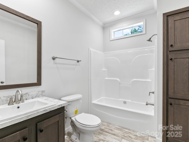 208 Walnut Branch Rd, Weaverville, NC 28787 - bathroom with ornamental molding, vanity, shower / washtub combination, a textured ceiling, and wood finished floors