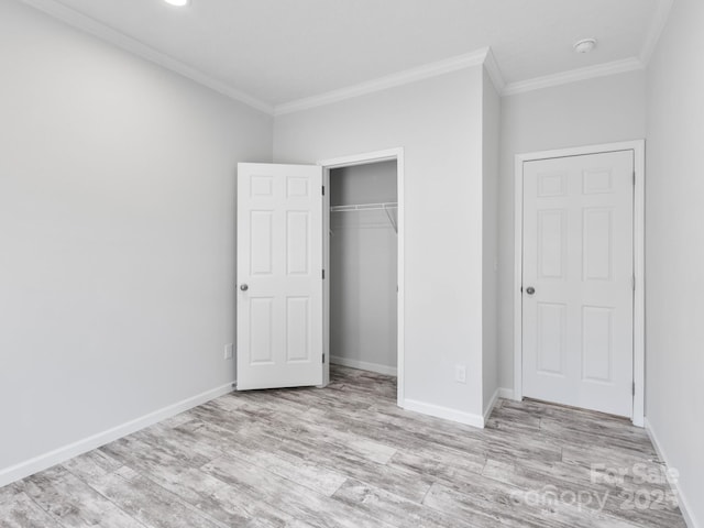 208 Walnut Branch Rd, Weaverville, NC 28787 - unfurnished bedroom with wood finished floors, ornamental molding, and a closet