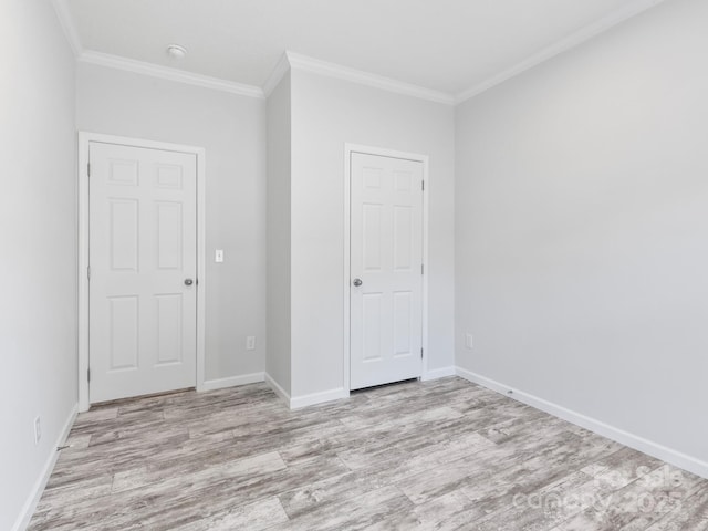 208 Walnut Branch Rd, Weaverville, NC 28787 - unfurnished bedroom featuring ornamental molding and wood finished floors